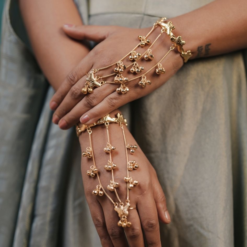 Patralekha premium antique brass kashmiri earrings with square green stone and mint cats eye stone paired with matching butterfly multi strand haathphool hand harness