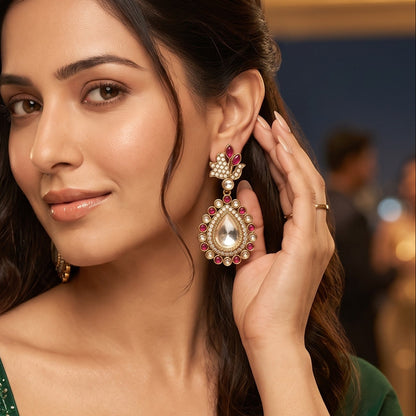 Mansi premium antique gold kundan chandelier earrings featuring pastel mint green marquise leaf studs an asymmetric pavé crystal scroll a large teardrop pendant with a central clear dabi stone and a mint green kemp halo