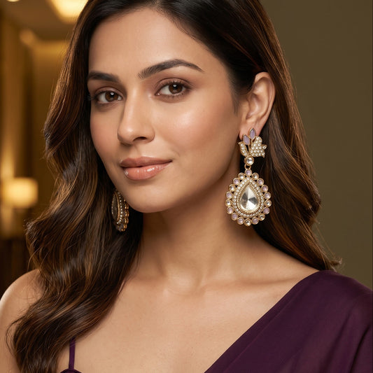 Mansi premium antique gold kundan chandelier earrings featuring pastel mint green marquise leaf studs an asymmetric pavé crystal scroll a large teardrop pendant with a central clear dabi stone and a mint green kemp halo