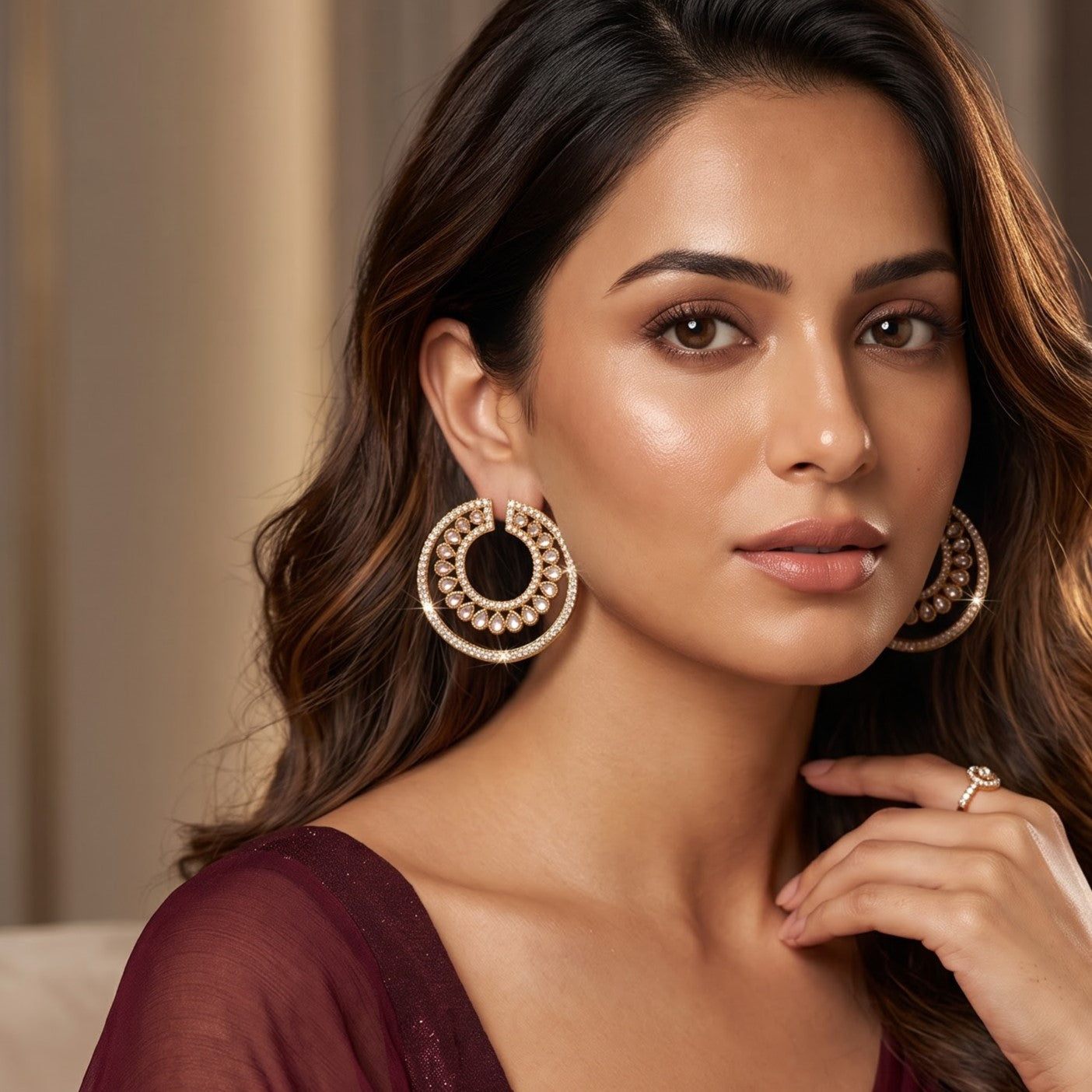 Rabiya premium antique gold kundan statement stud earrings featuring an open crescent circular geometry with concentric halos of teardrop stones and clear pavé crystals