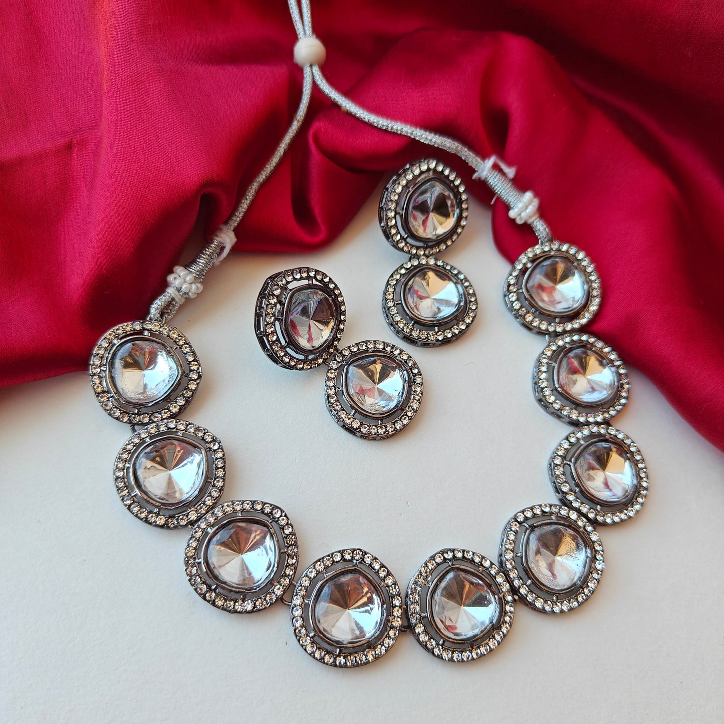 Vipasa Black Metal Polki Look Alike Necklace Set with Earrings