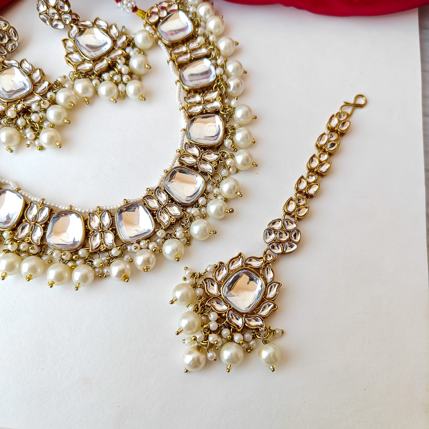 Rajvi Kundan Necklace Set with Earrings & Tika
