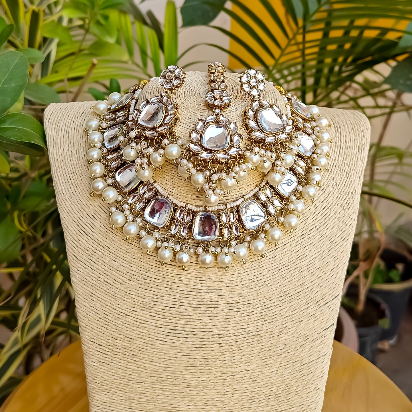 Rajvi Kundan Necklace Set with Earrings & Tika