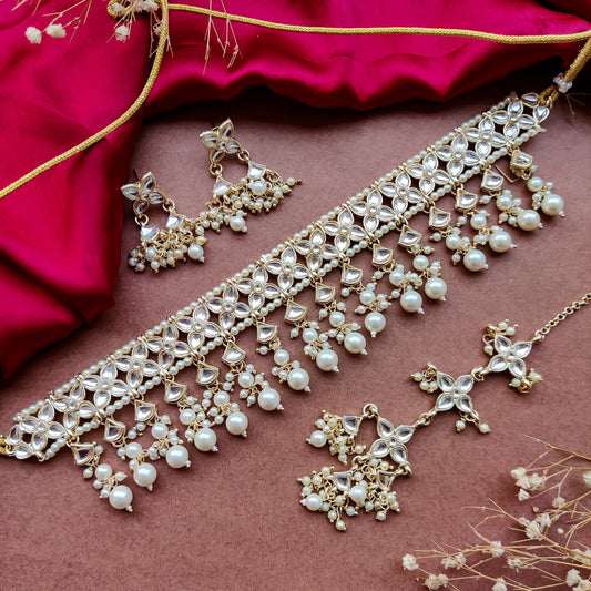 Mridul Golden Necklace Set with Earrings & Tika