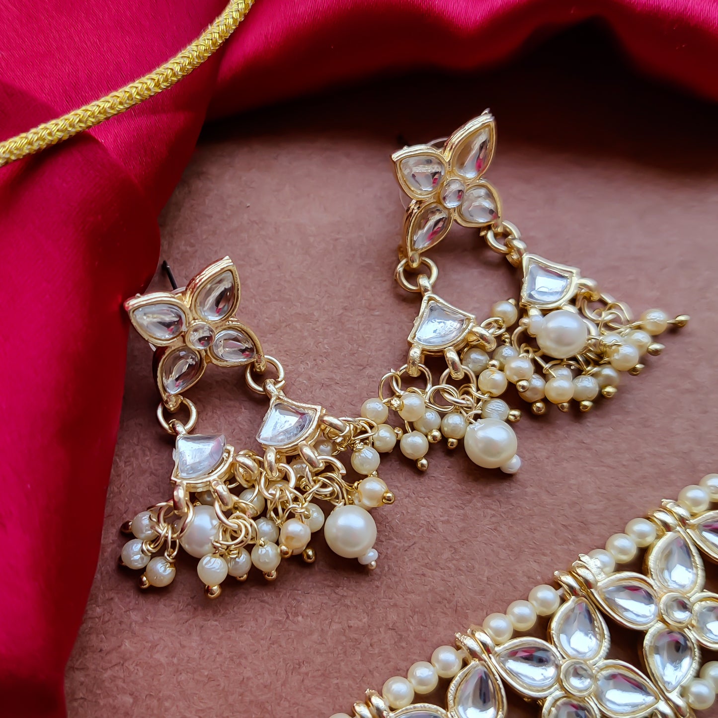 Mridul Golden Necklace Set with Earrings & Tika