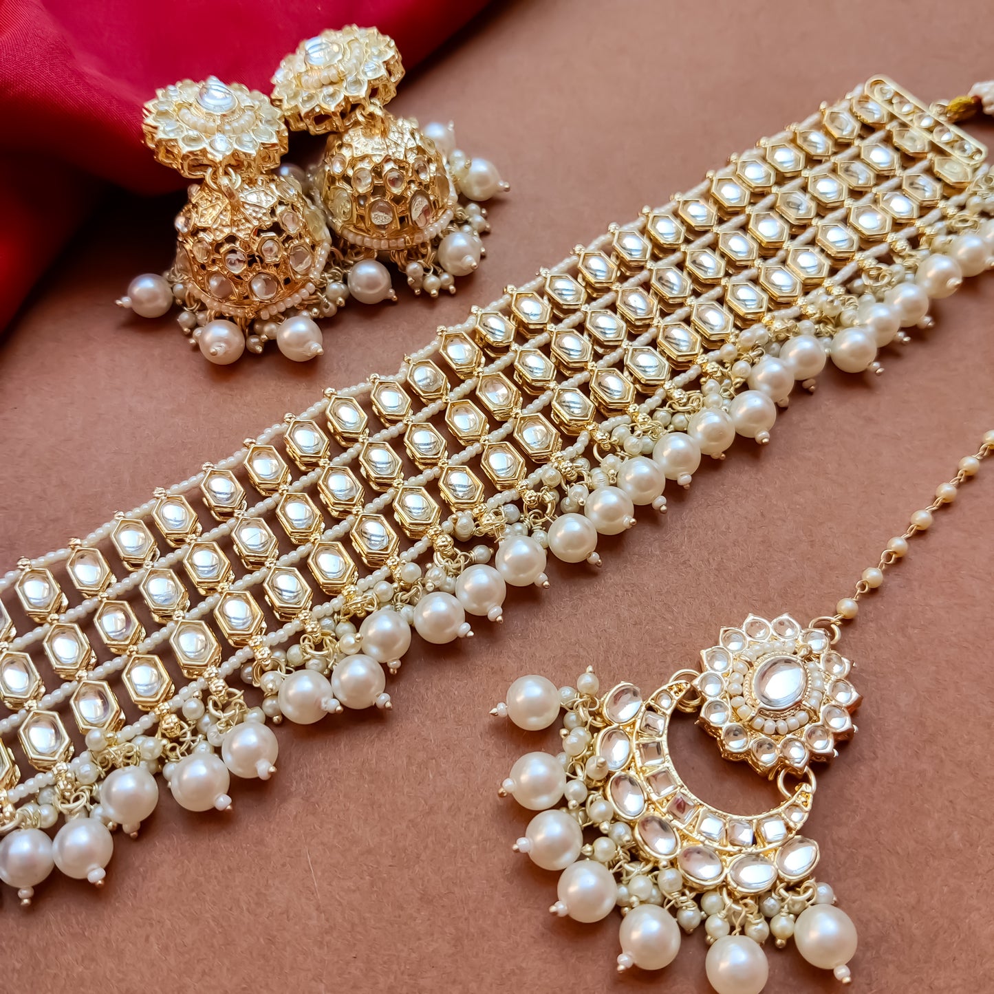 Mehvish Golden Kundan Necklace Set with Earrings & Tika